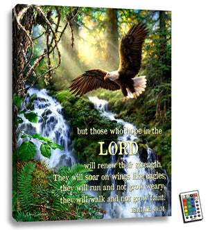  This stunning 18x24 canvas features a majestic bald eagle soaring over a peaceful stream, with rays of light filtering through the surrounding forest.  But that's not all - this artwork also features the uplifting words of Isaiah 40:31